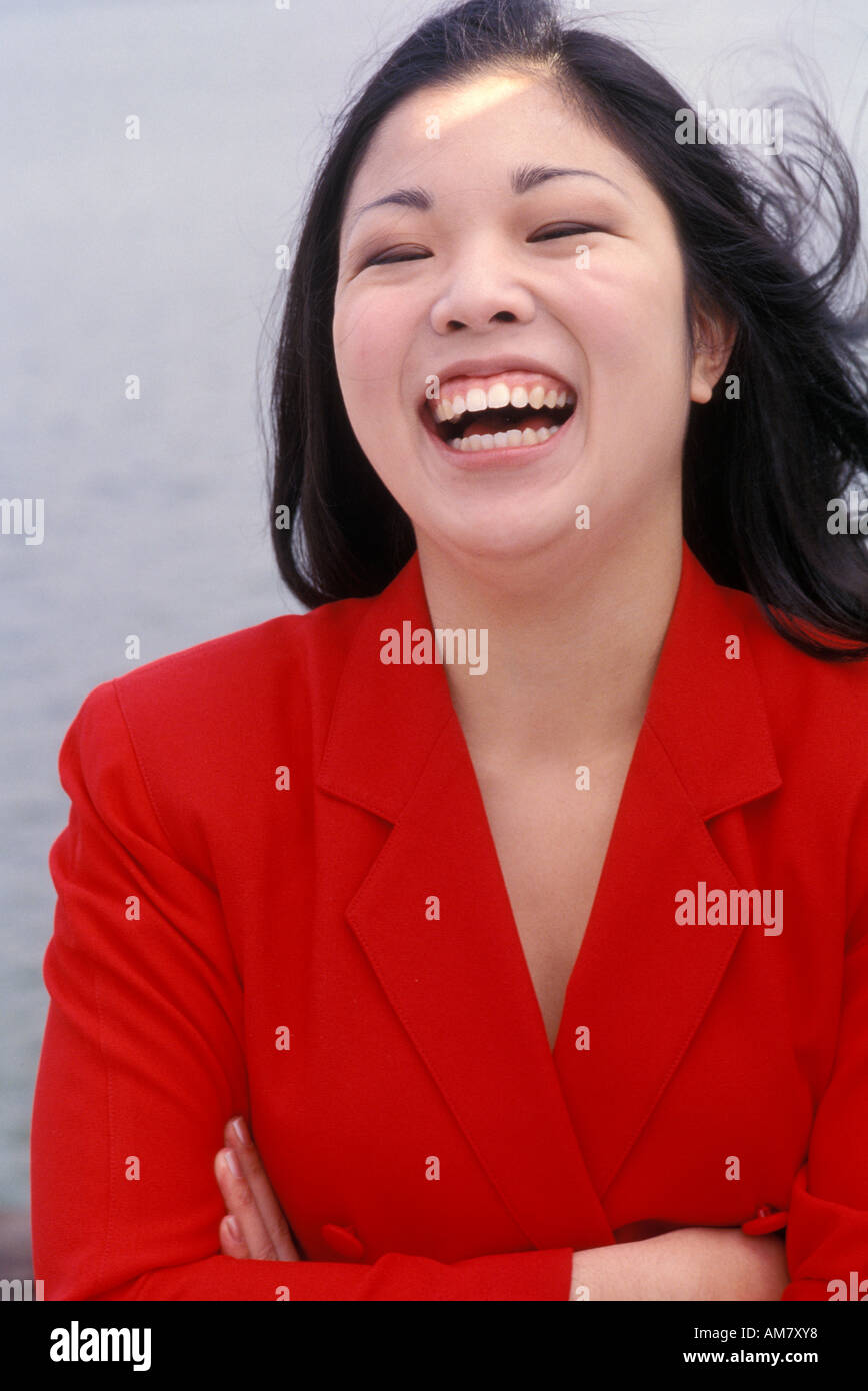 Beautiful young woman black hair laughing hi-res stock photography and ...