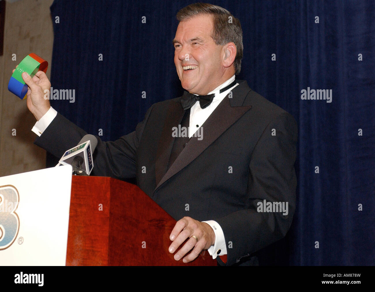 Secretary of Homeland Security Tom Ridge holds up colored duct tape during the 15th Annual Roast for Spina Bifida which honored Stock Photo