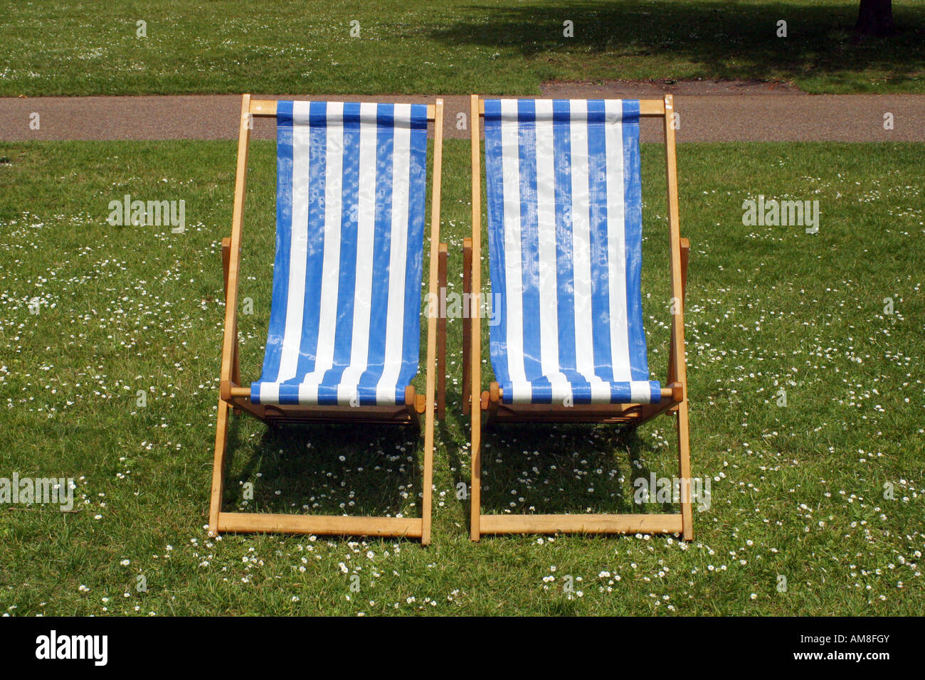 Empty deck chairs in a park England UK Stock Photo Alamy