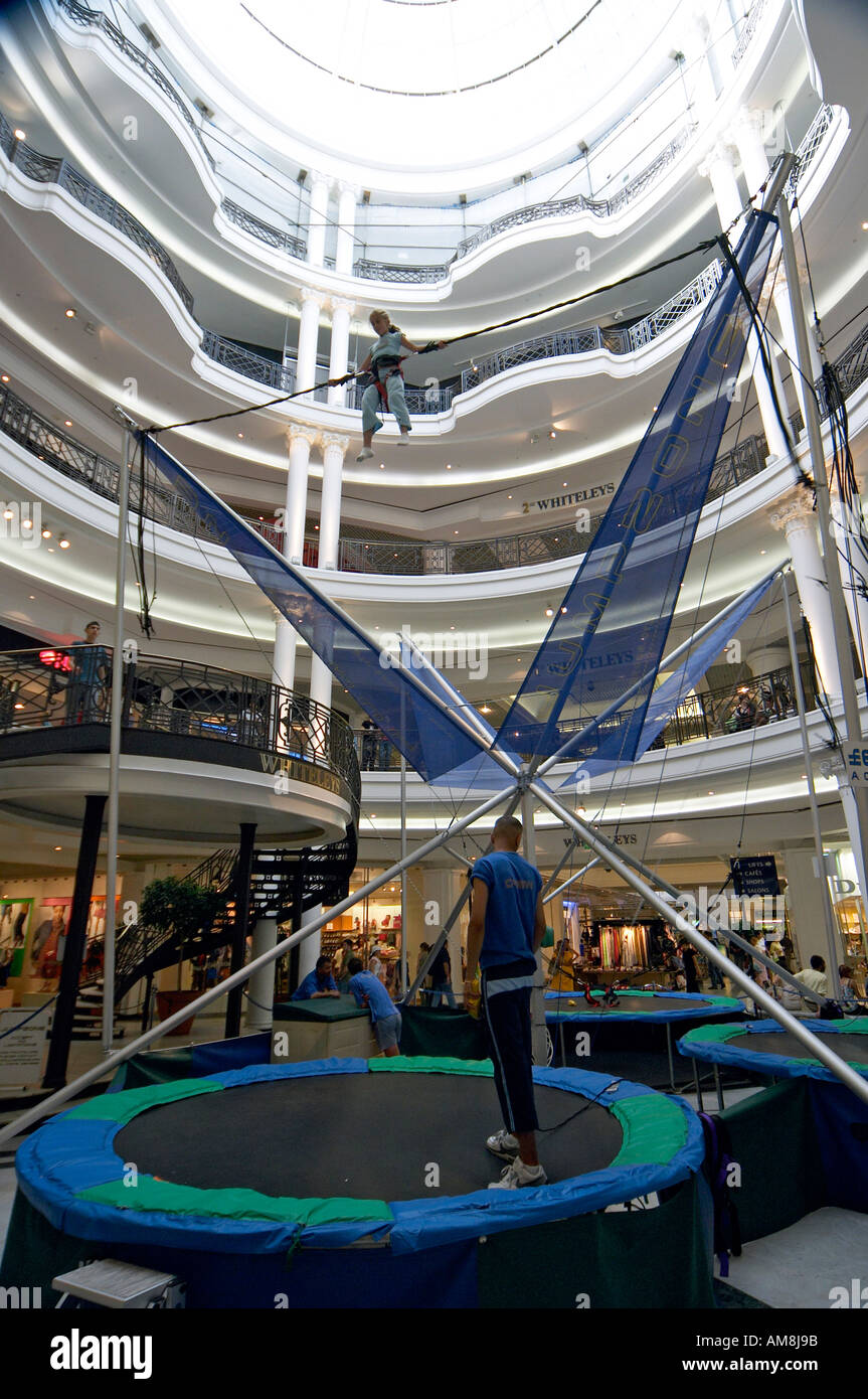 Girl on Jumpzone bungee trampoline in Whiteleys Shopping Centre
