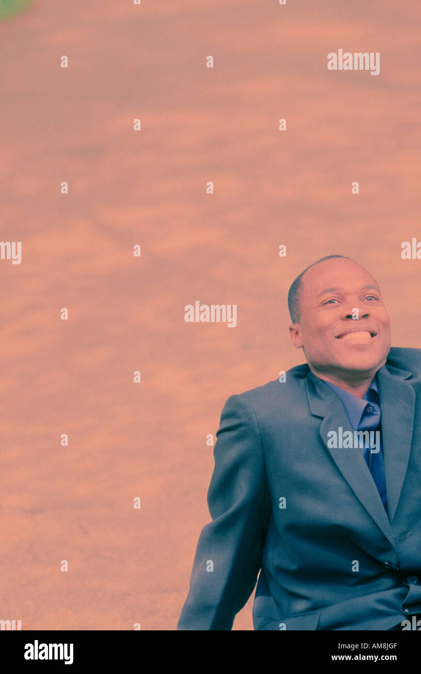 Businessman smiling, looking away Stock Photo