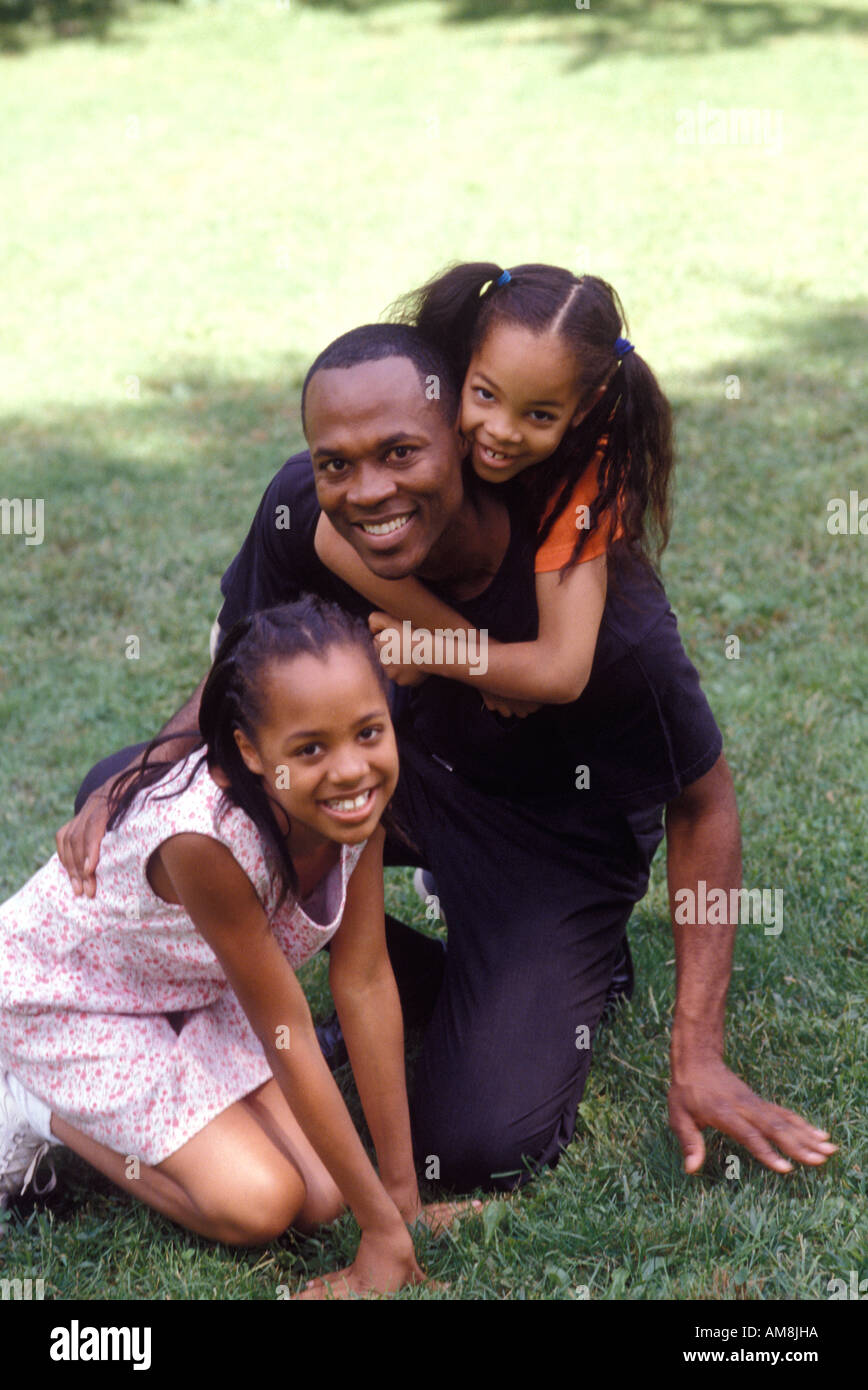 Father with daughters, portrait Stock Photo
