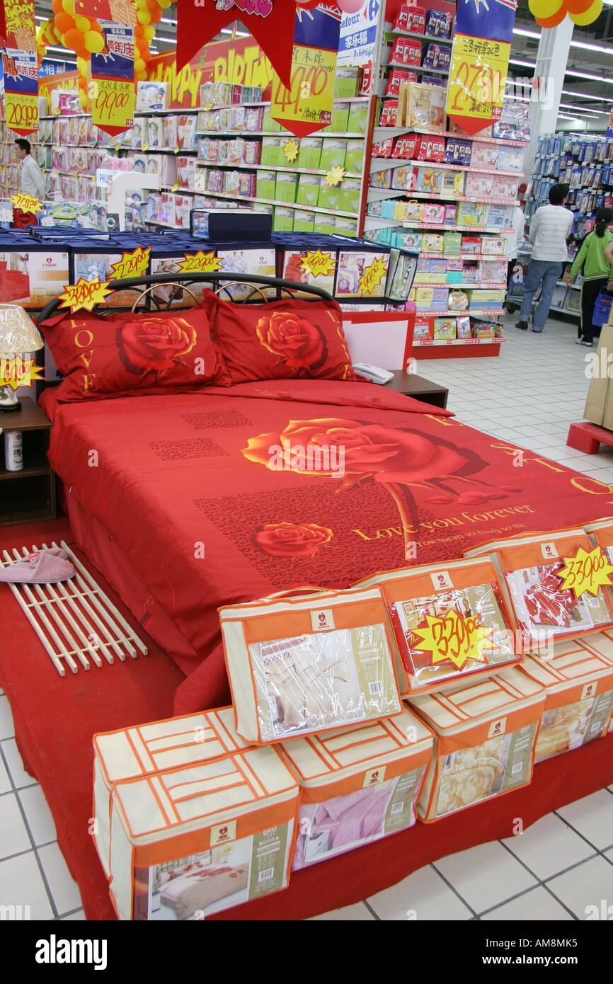 Bed display at the Carrefour Store Pudong Shanghai China Blanket says