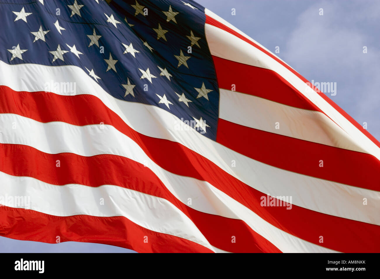 American flag blows in the wind Stock Photo