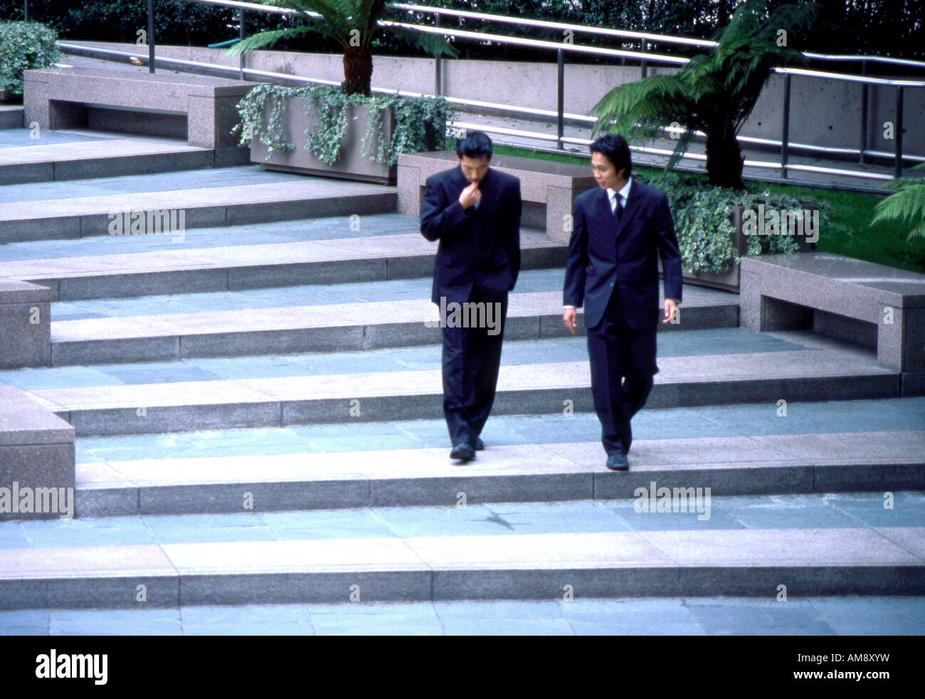 Businessmen on Stairs Stock Photo - Alamy