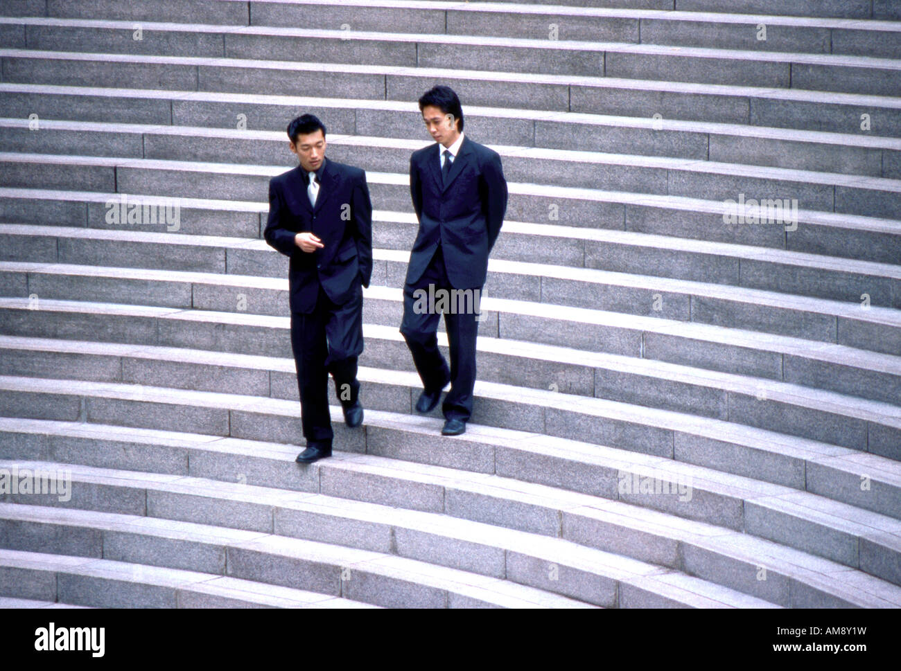 Businessmen on Stairs Stock Photo - Alamy