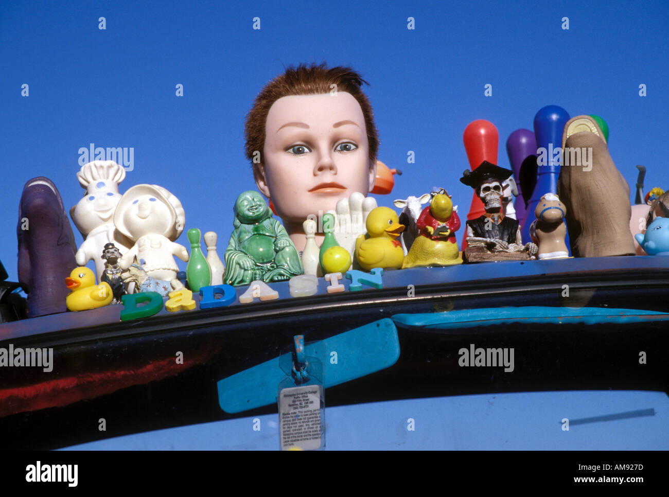 Toys Glued on Roof of Car Stock Photo