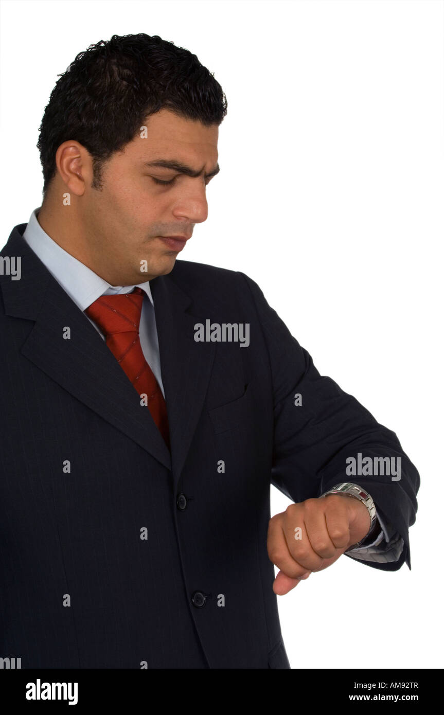 Businessman looking at his wrist watch Stock Photo