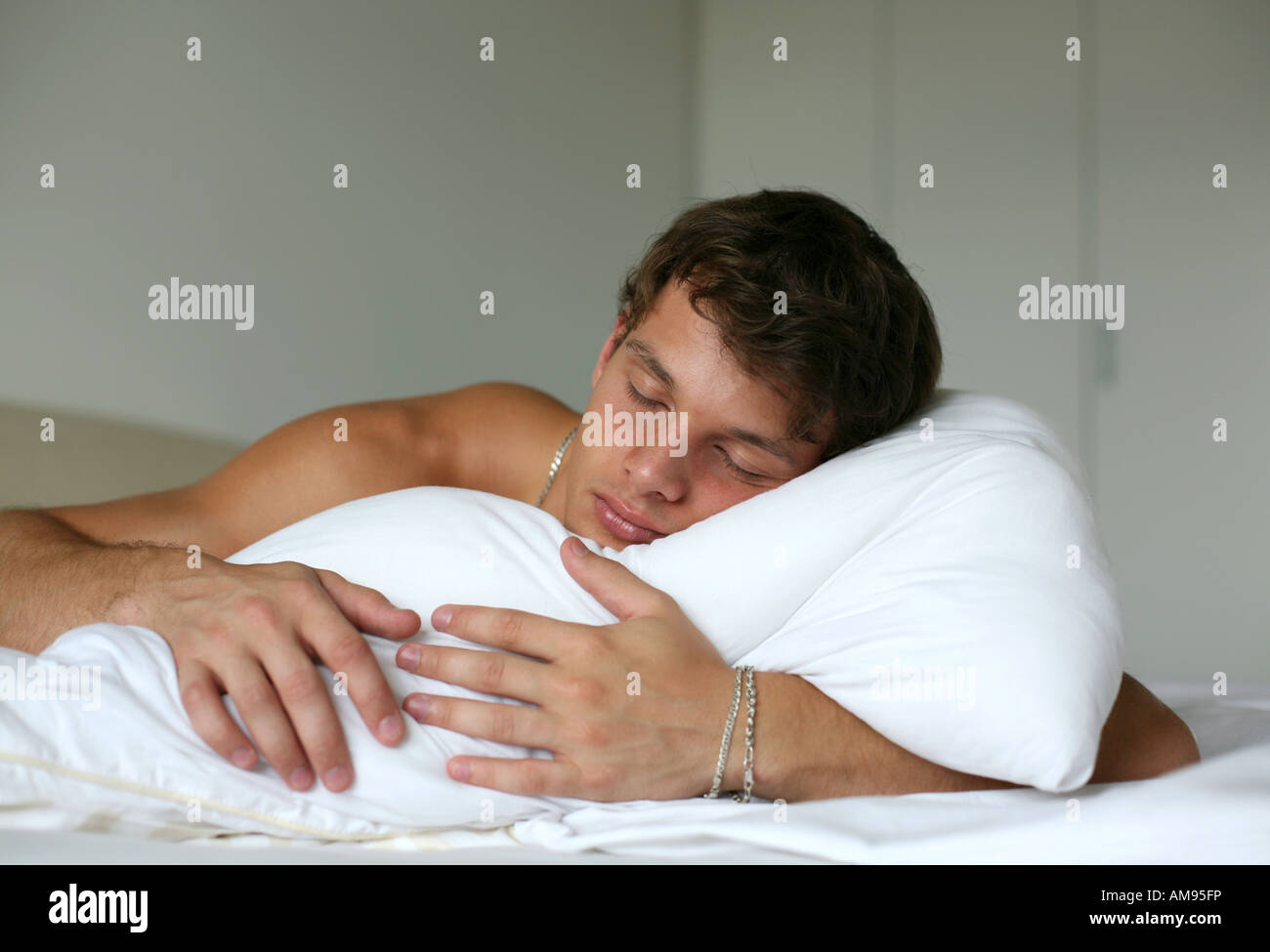 Sleeping sexy man Stock Photo - Alamy