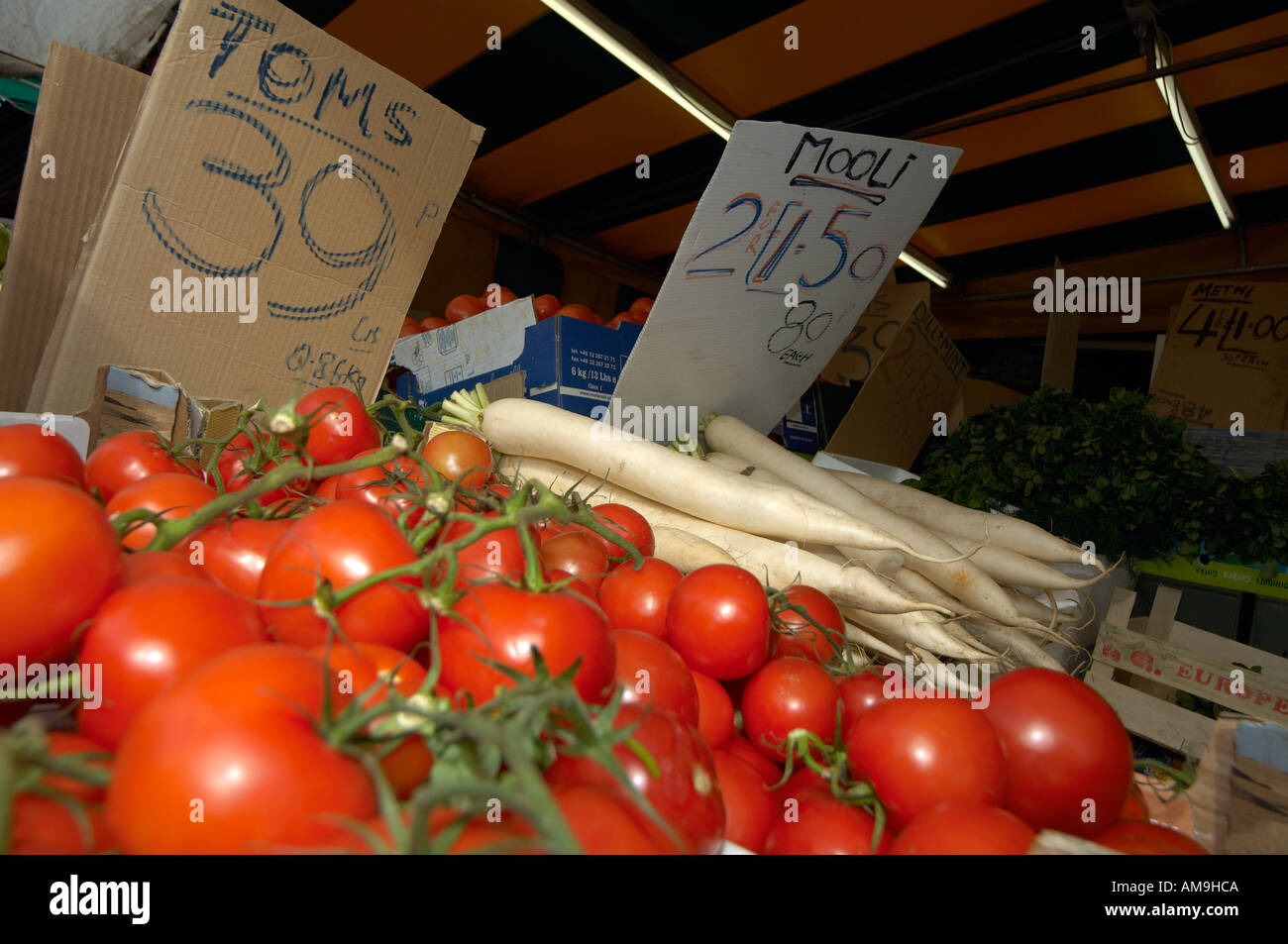 Market stall selling fruit and veg at Green Street East London UK Stock