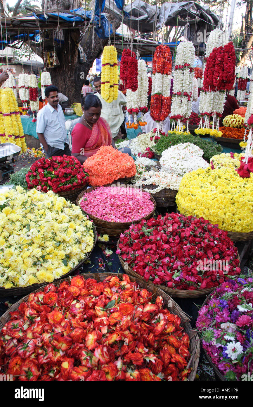 A colourful flower stall at the Gandhi Bazaar in Bangalore, India, with