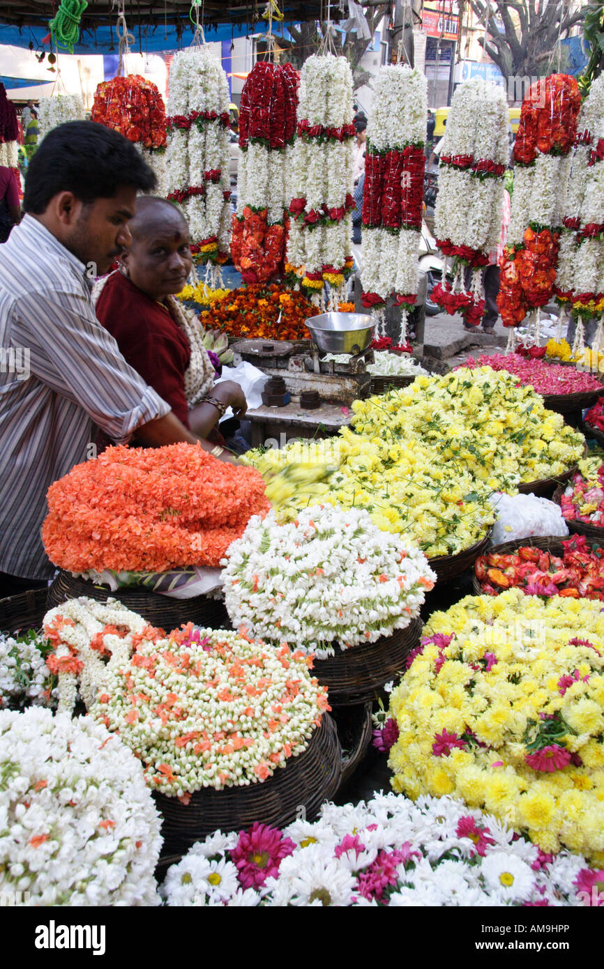 A colourful flower stall at the Gandhi Bazaar in Bangalore, India, with