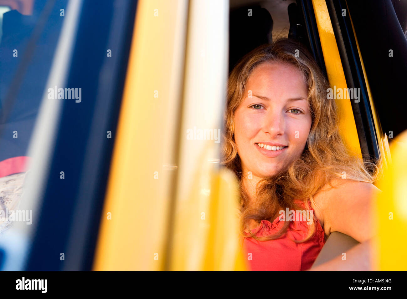 Woman In A Van Smiling Stock Photo Alamy