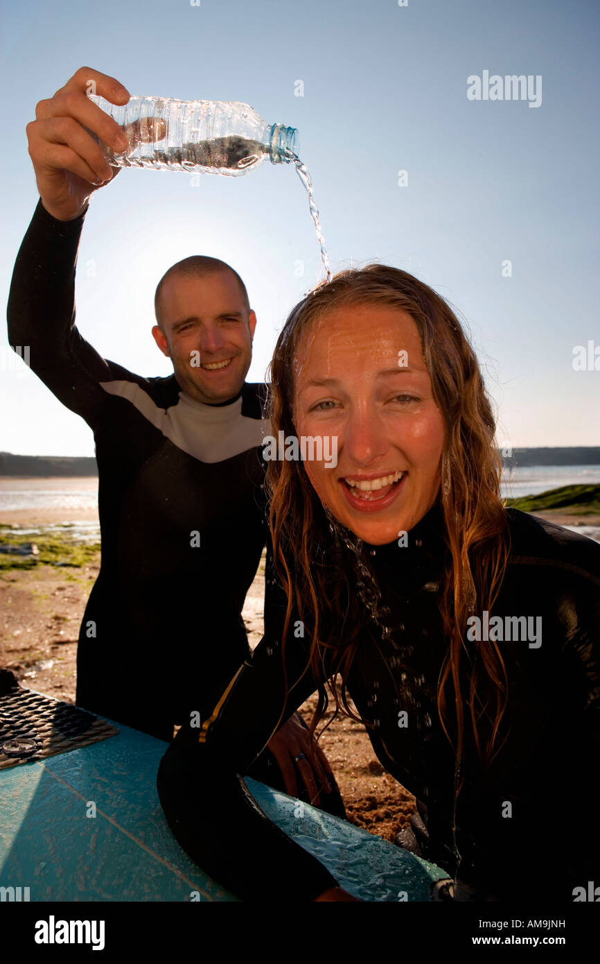 Man pouring water on head hires stock photography and images Alamy