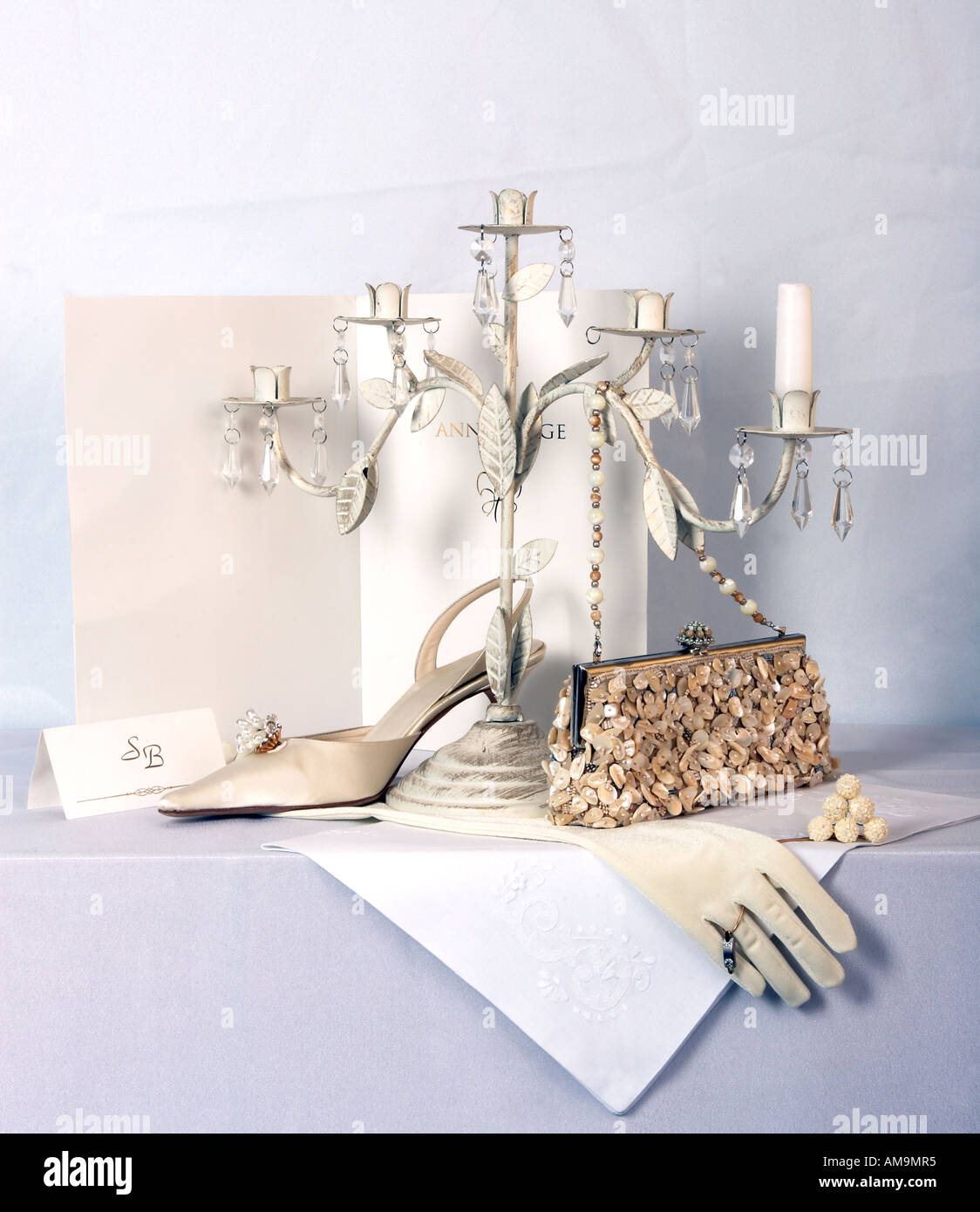 A portrait of some accessories used by the bride at a wedding seen here in a montage. Stock Photo