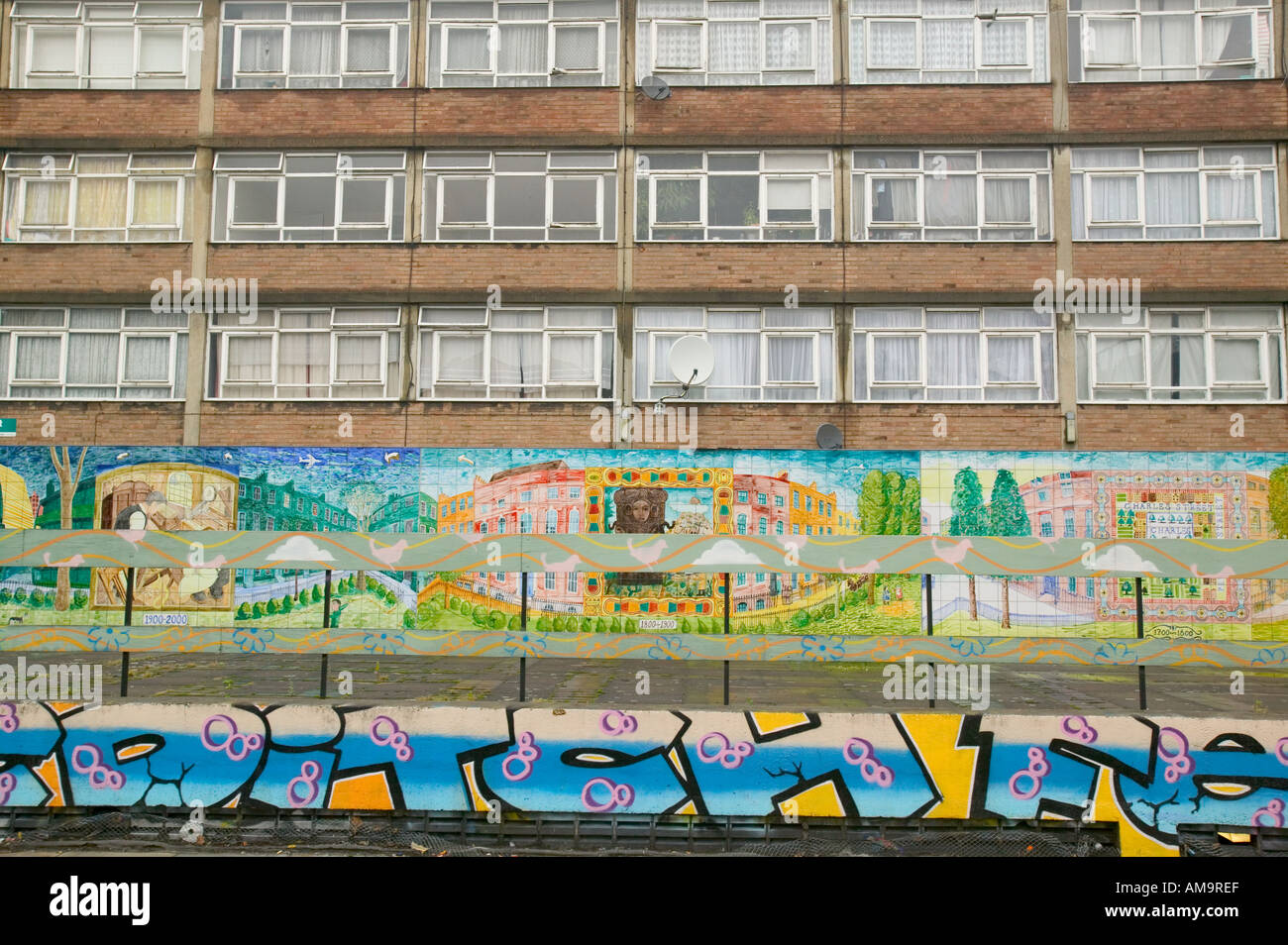 murals painted on run down council flats in the Borough of Hackney London Stock Photo