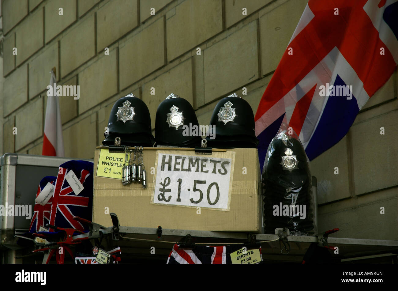 Novelty English policemen helmets for sale in London Stock Photo