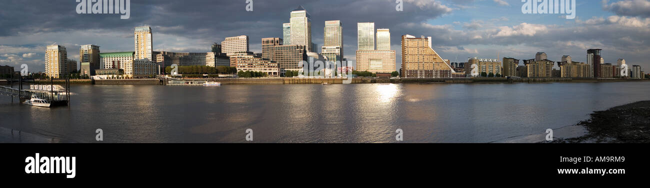 View across River Thames towards Canary Wharf complex Docklands London Stock Photo