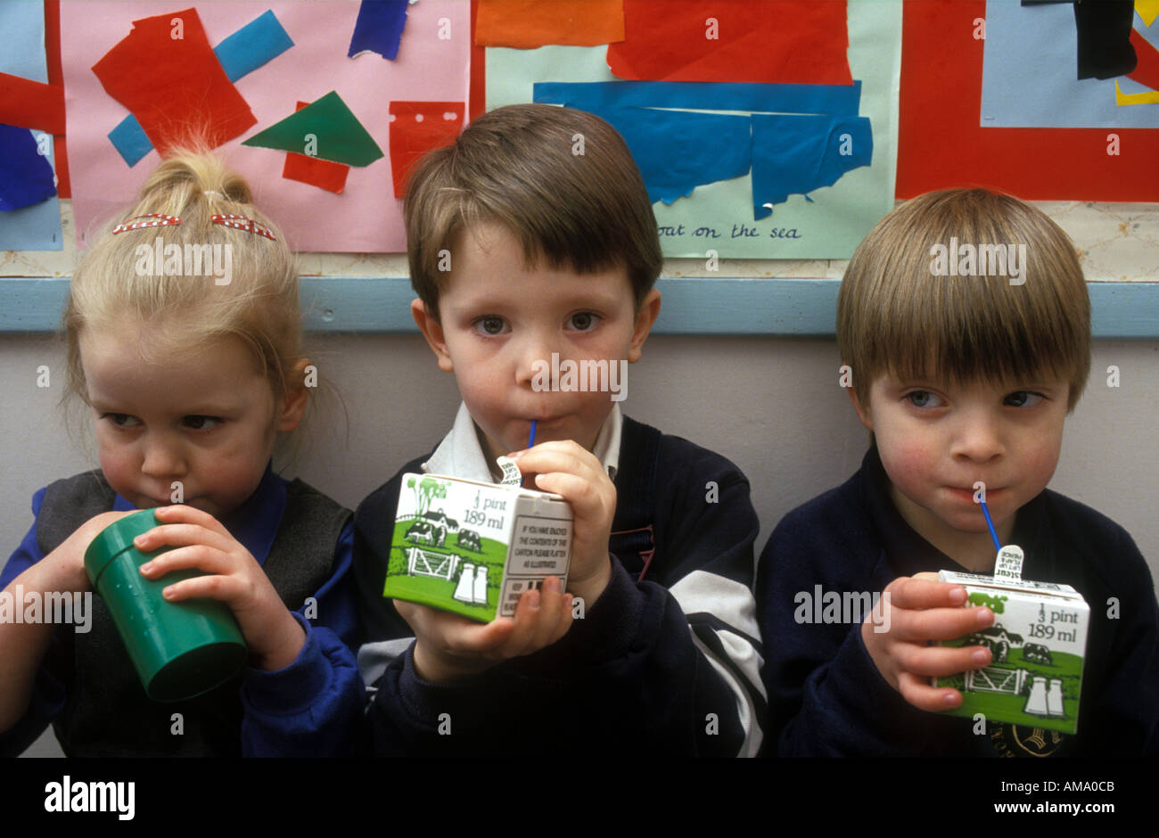 Primary school children drinking milk Stock Photo Alamy
