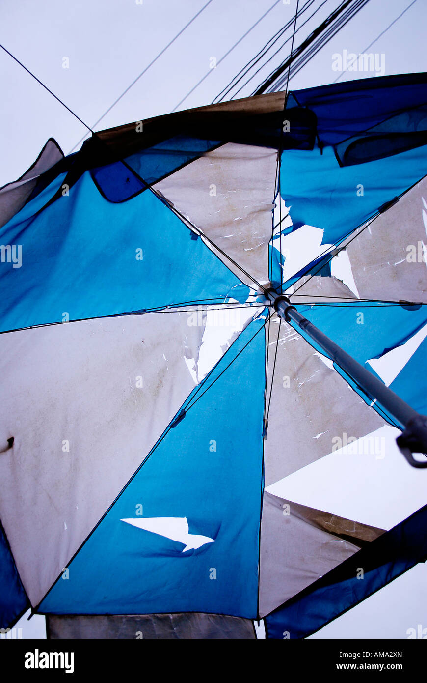 Umbrella Rip Leaky umbrella hi-res stock photography and images - Alamy