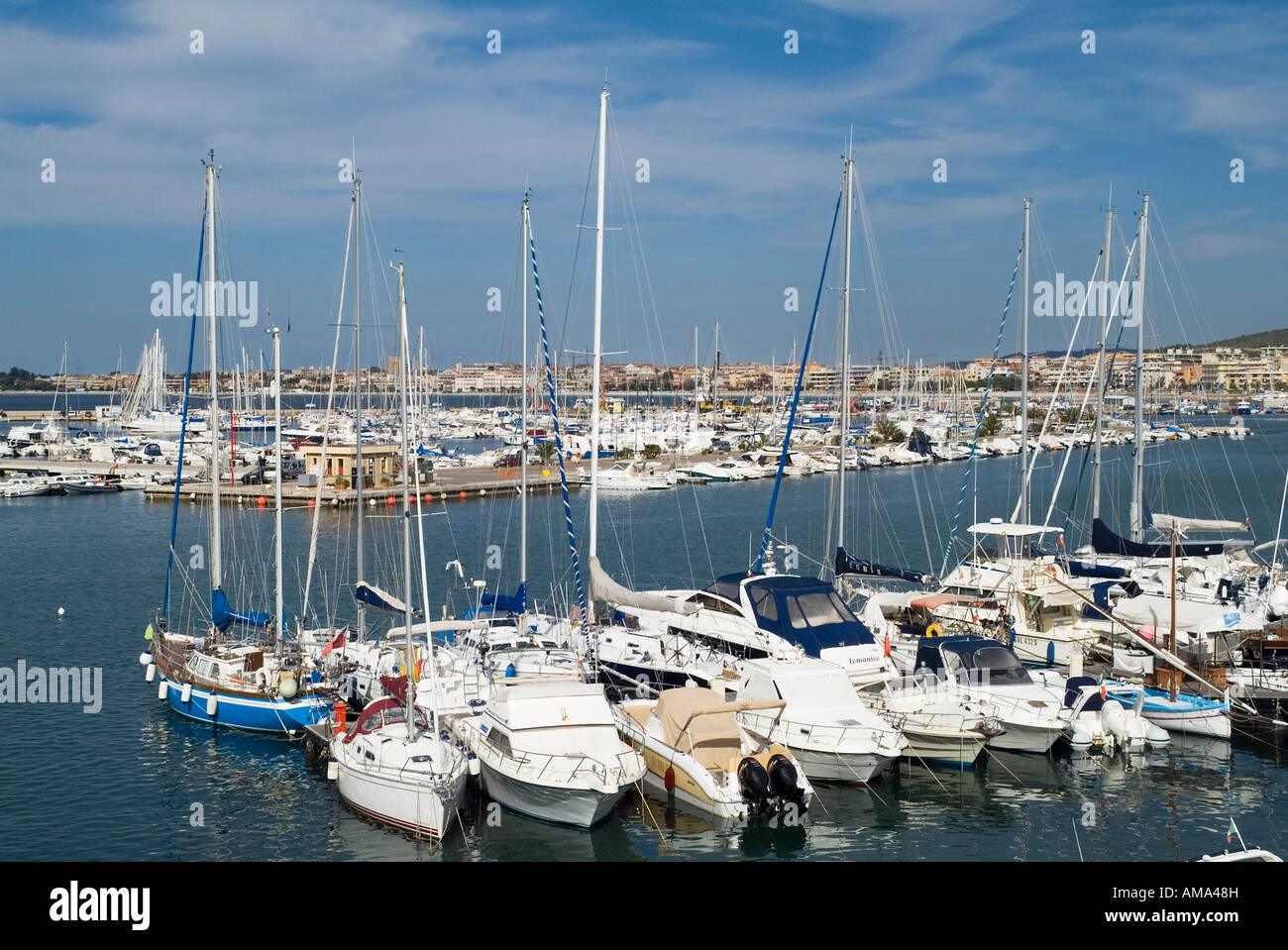dh Alghero Marina ALGHERO SARDINIA Yachts and boats at pontoons harbour berth mediterranean italy Stock Photo