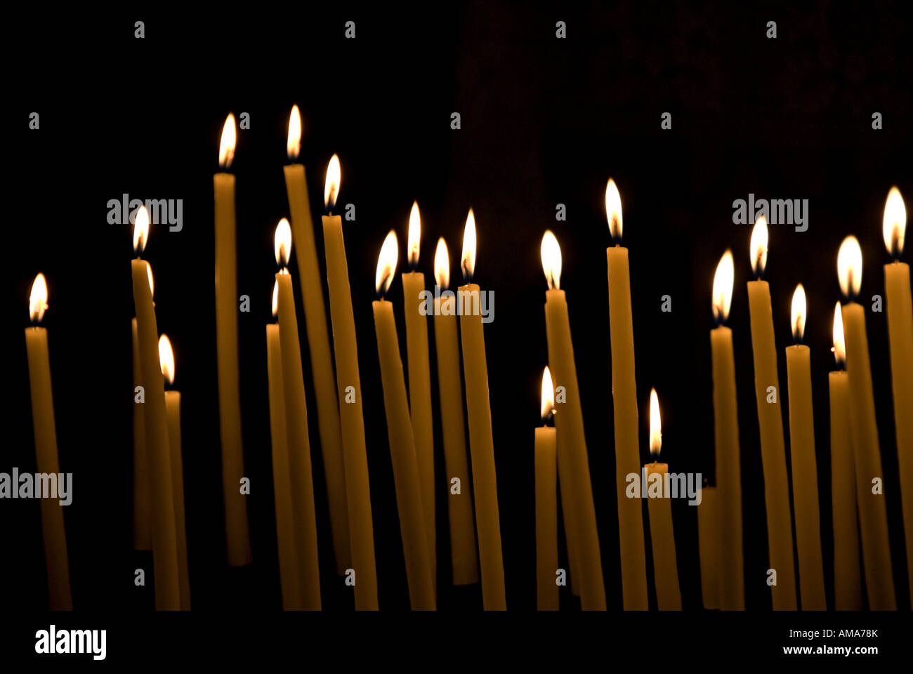 images of candles in churches in which a prayer is made and a candle