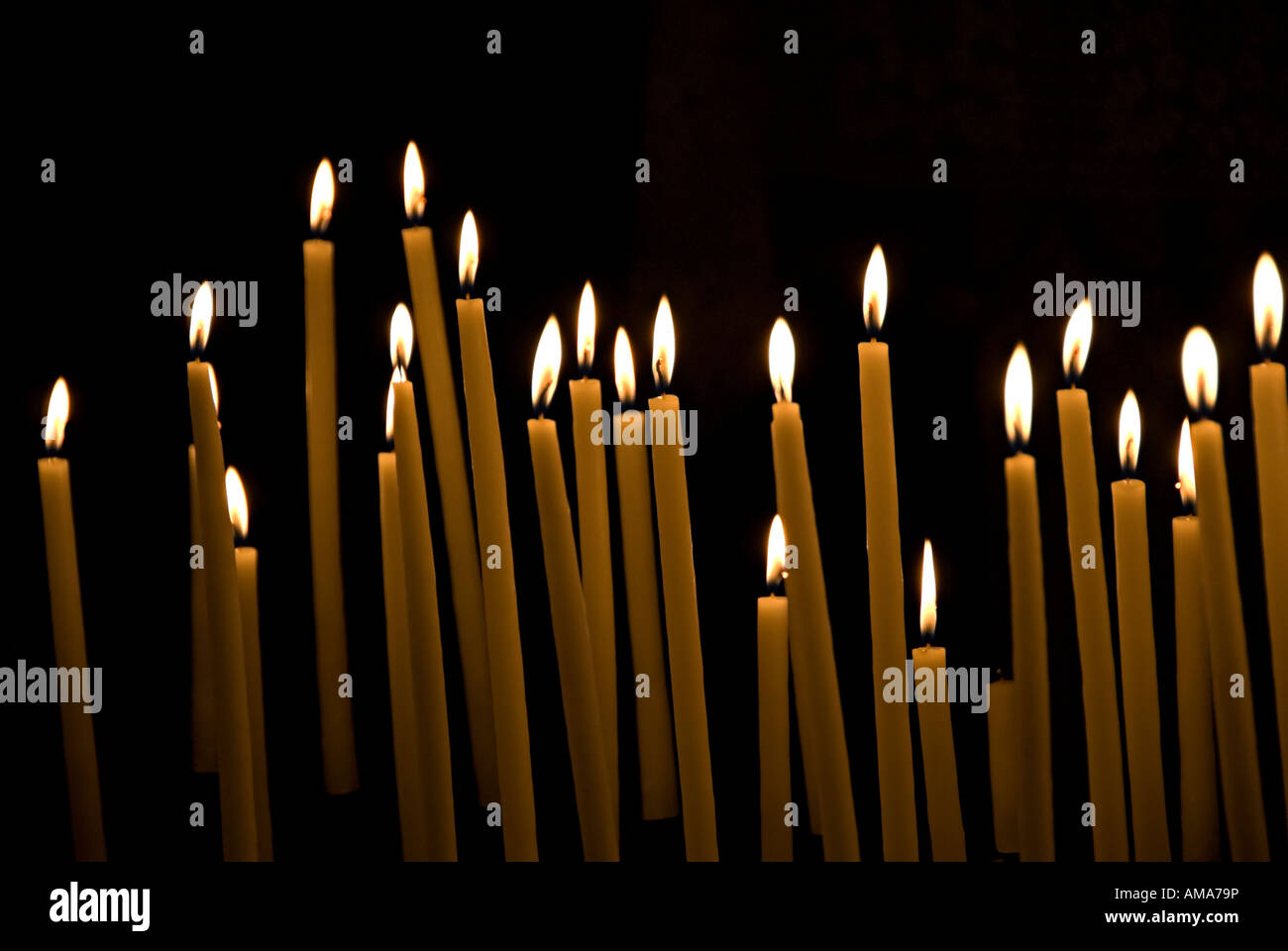 images of candles in churches in which a prayer is made and a candle