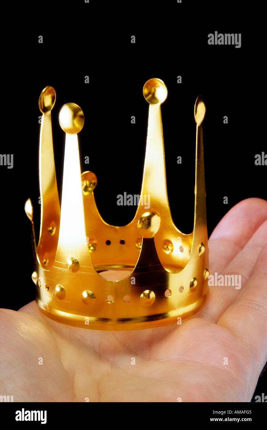 Hand crown hi-res stock photography and images - Alamy