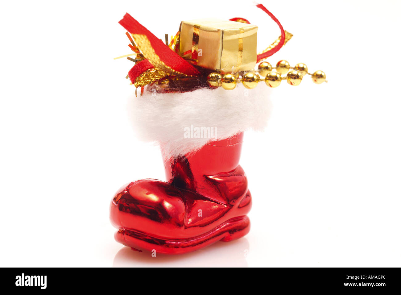 Santa Claus boot with gifts, close-up Stock Photo