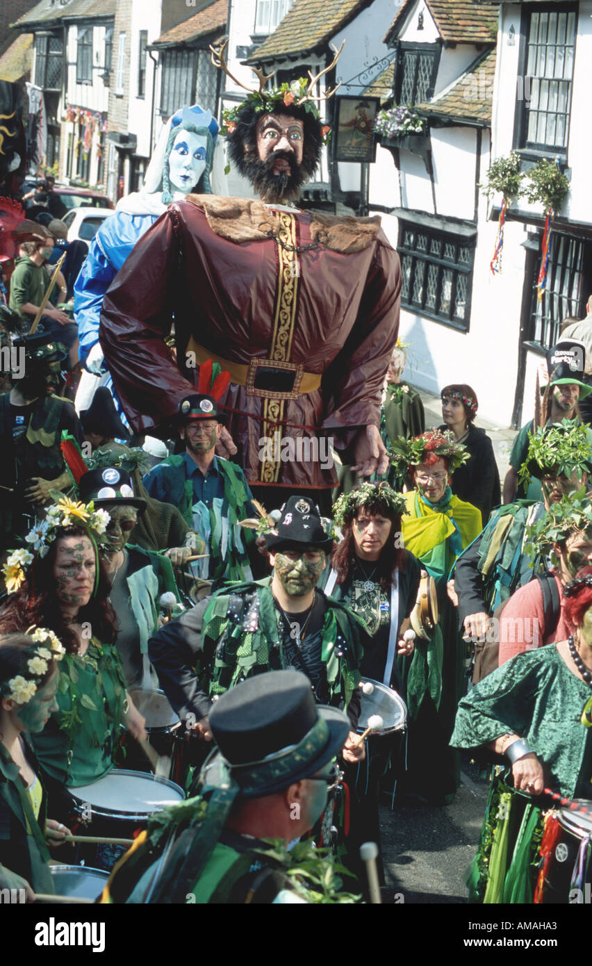 Giant folk figures procession All Saints Street traditional green men at Jack in the Green pagan festival 2005 Hastings East Sus Stock Photo