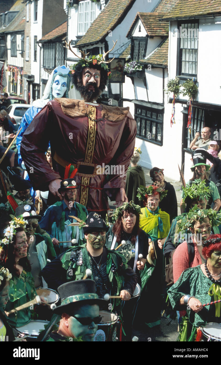 Giant folk figures procession All Saints Street Old Town Hastings traditional jack in the green pagan festival 2005 Hastings Ea Stock Photo