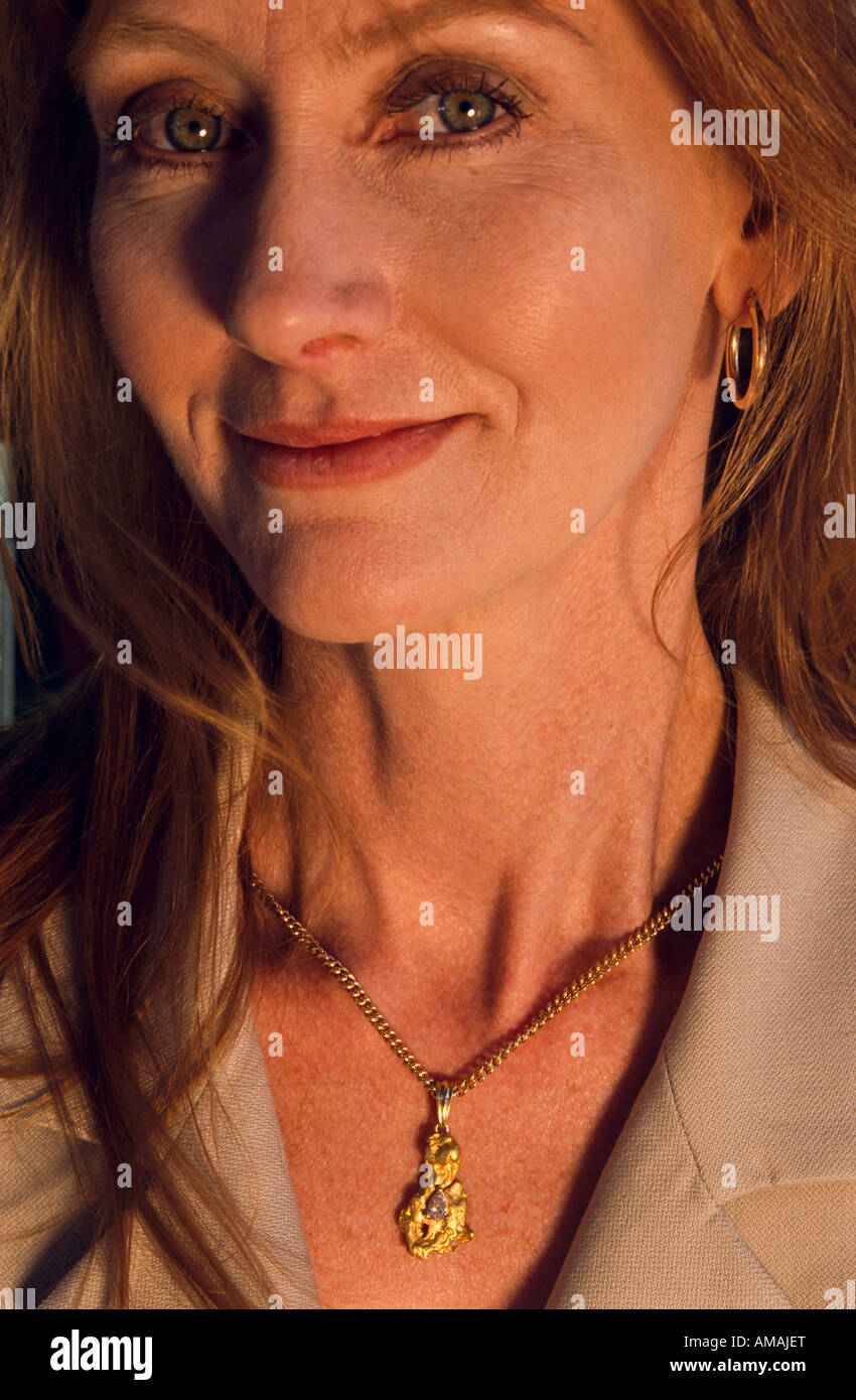 Woman wearing necklace Stock Photo Alamy