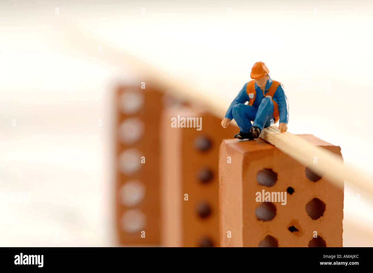 Figurine of construction worker Stock Photo