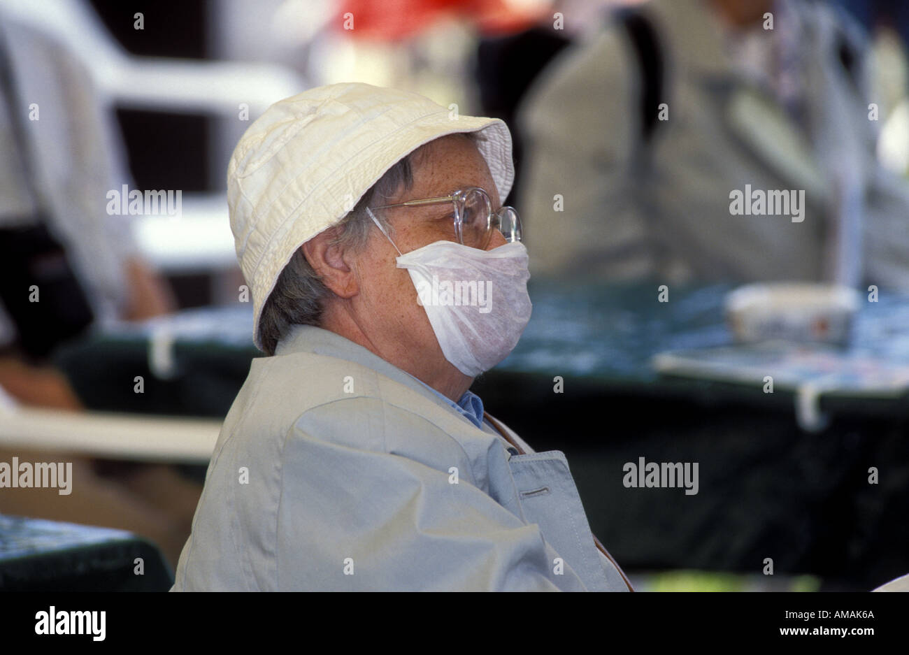 Person wearing a mask hi-res stock photography and images - Alamy