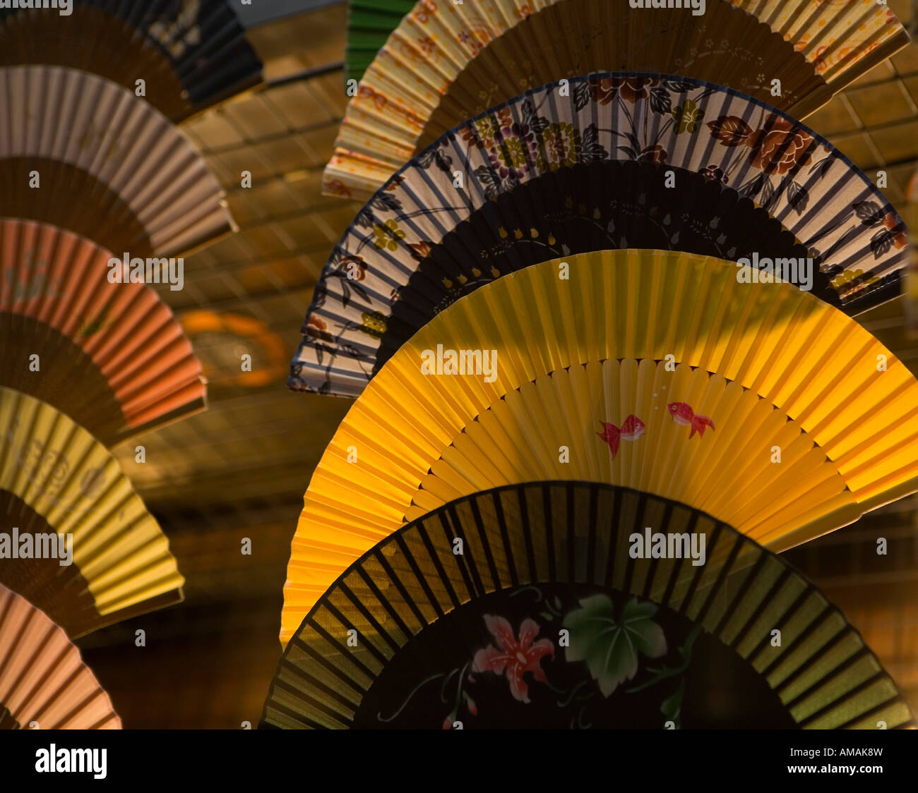 Japanese folding fans at sunset Stock Photo