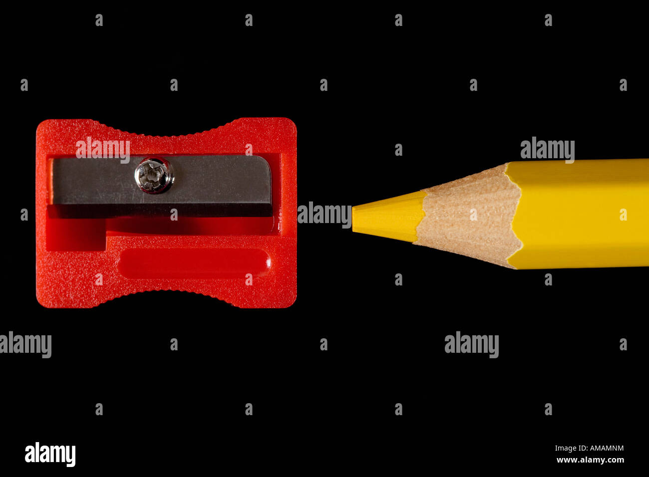 A colored pencil and sharpener Stock Photo