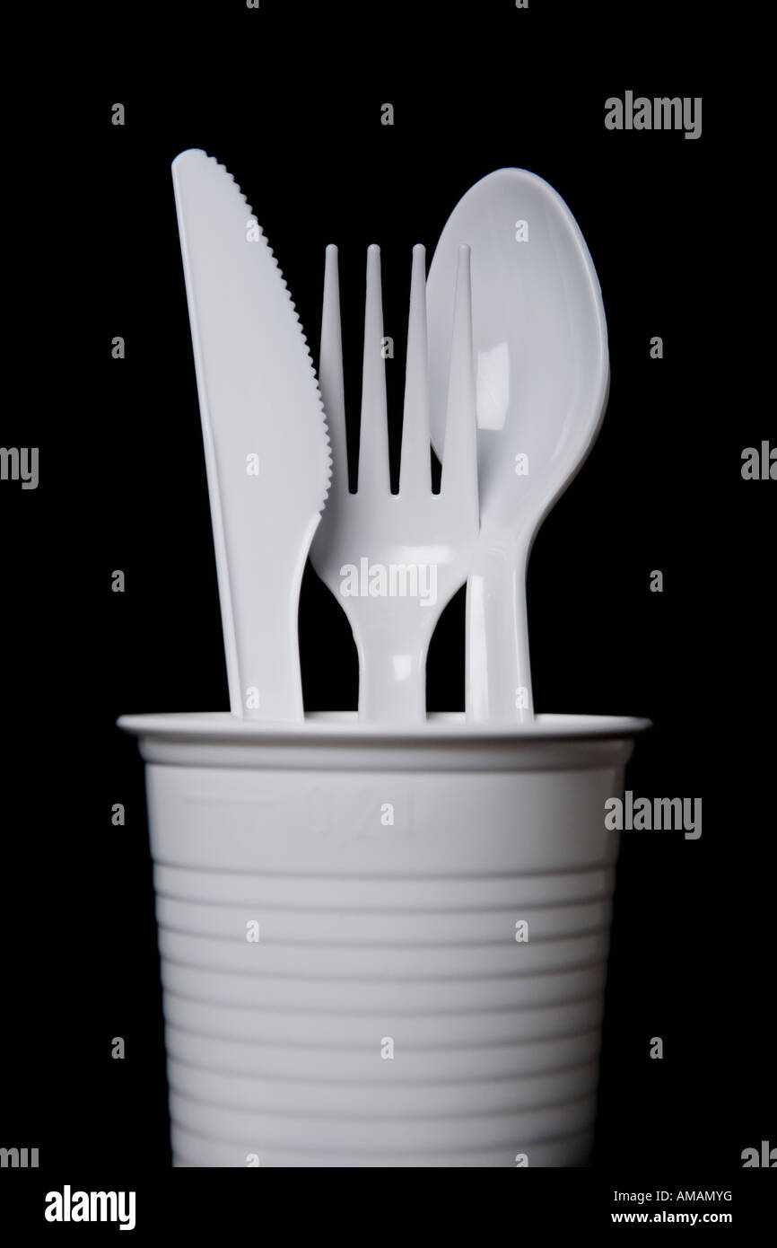 Plastic cutlery in a cup Stock Photo