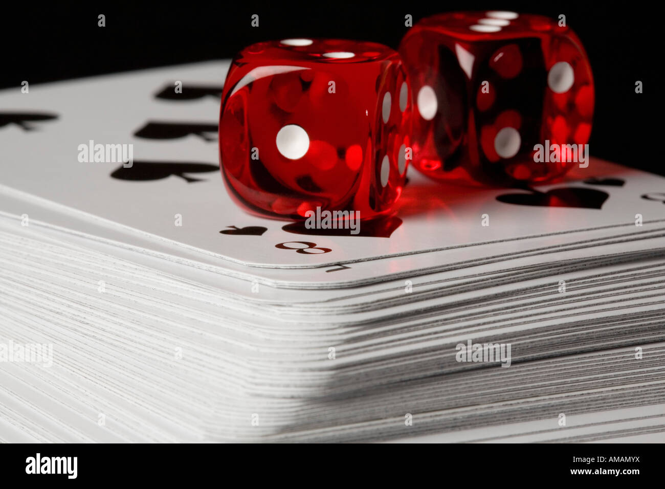 Two dice playing cards close up pack cards hires stock photography and