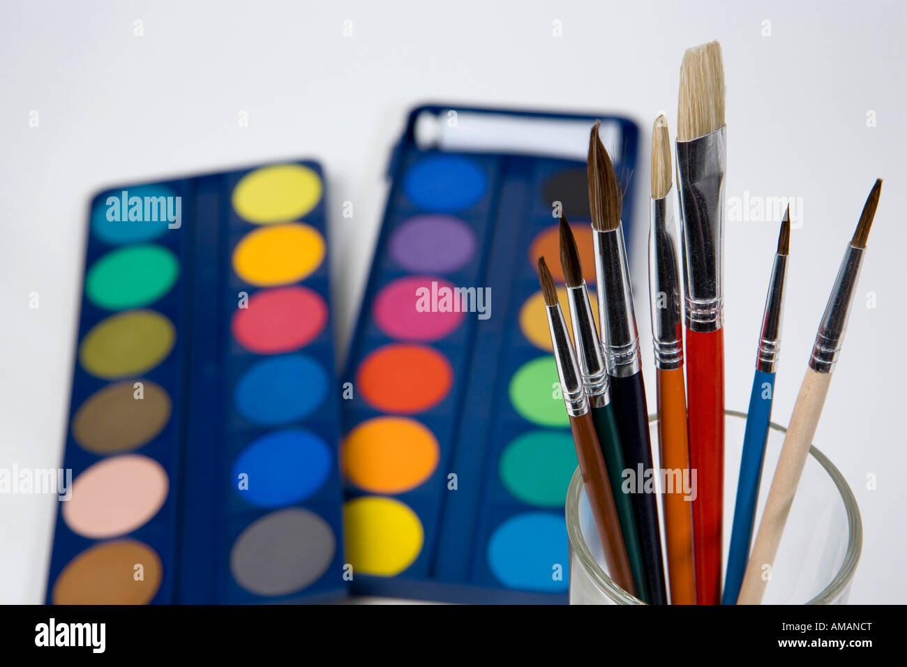 Paintbrushes and watercolor paints Stock Photo