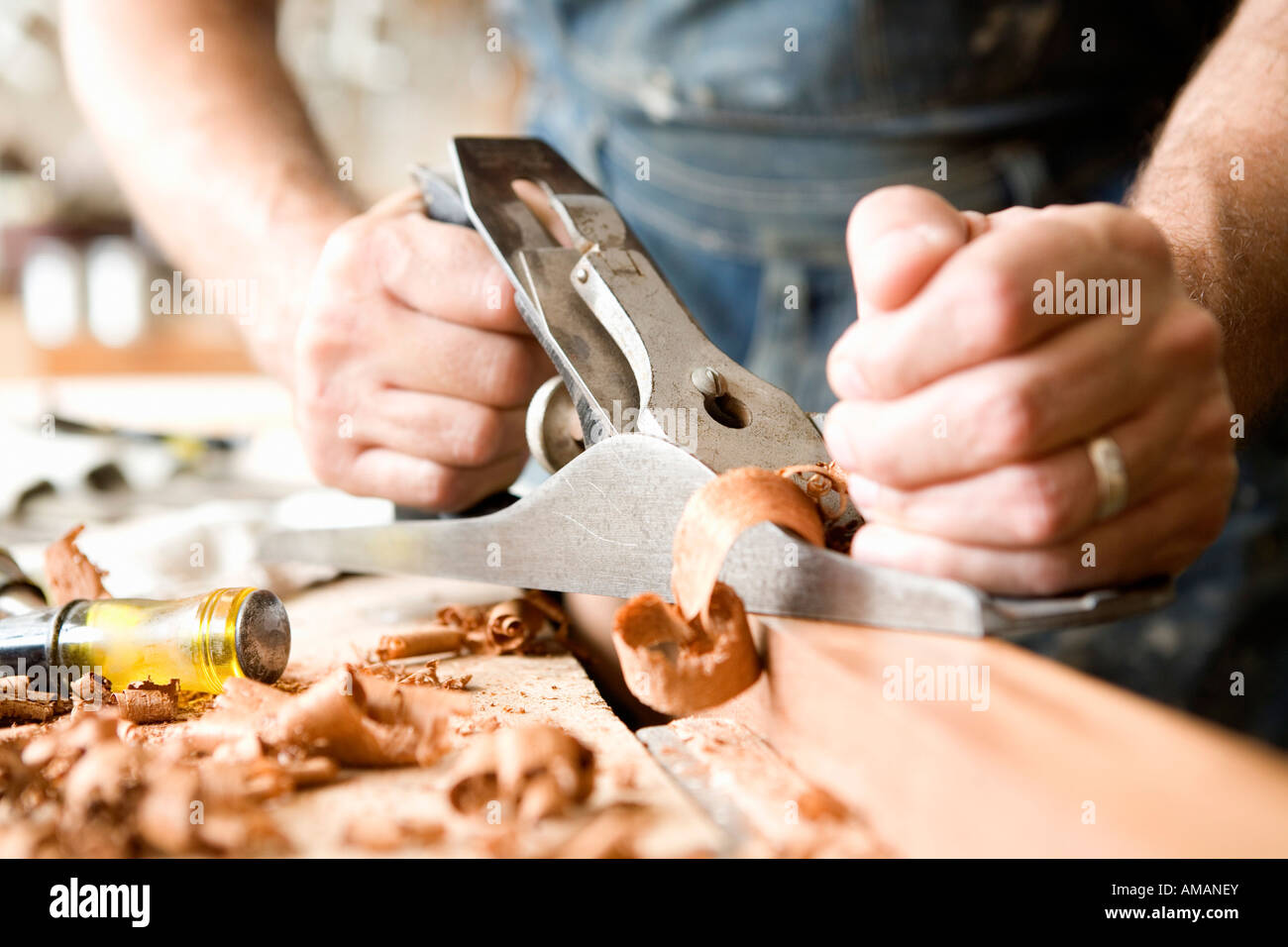 Detail of a carpenter planning wood Stock Photo Alamy
