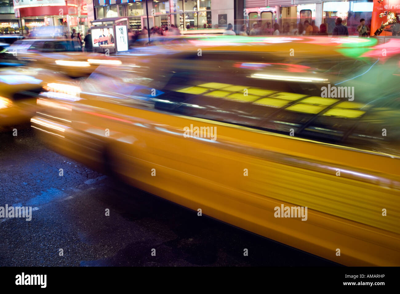 New York taxis driving through a street Stock Photo