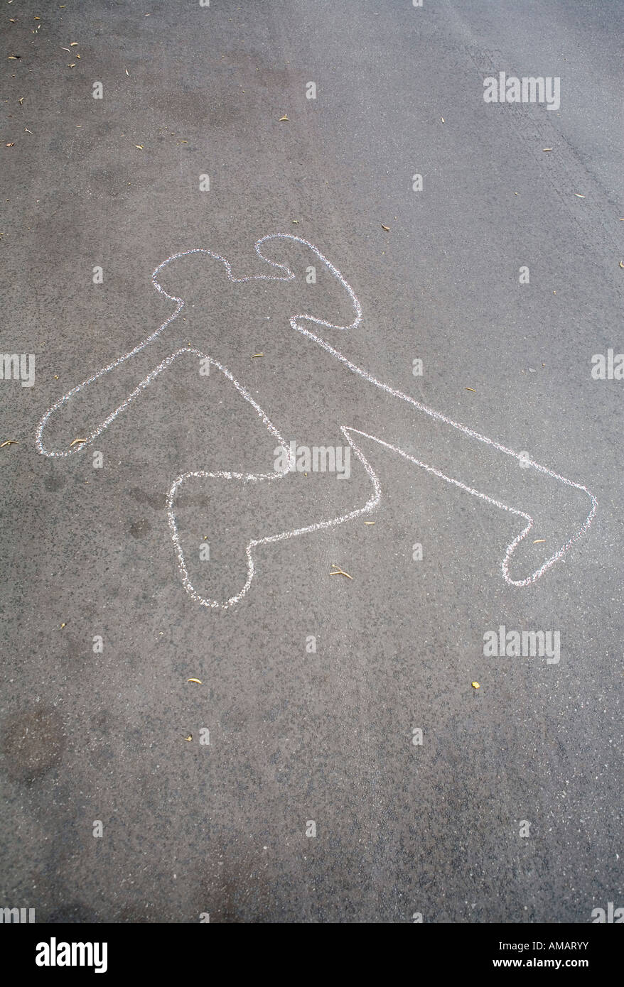 A chalk outline of a body on the road Stock Photo