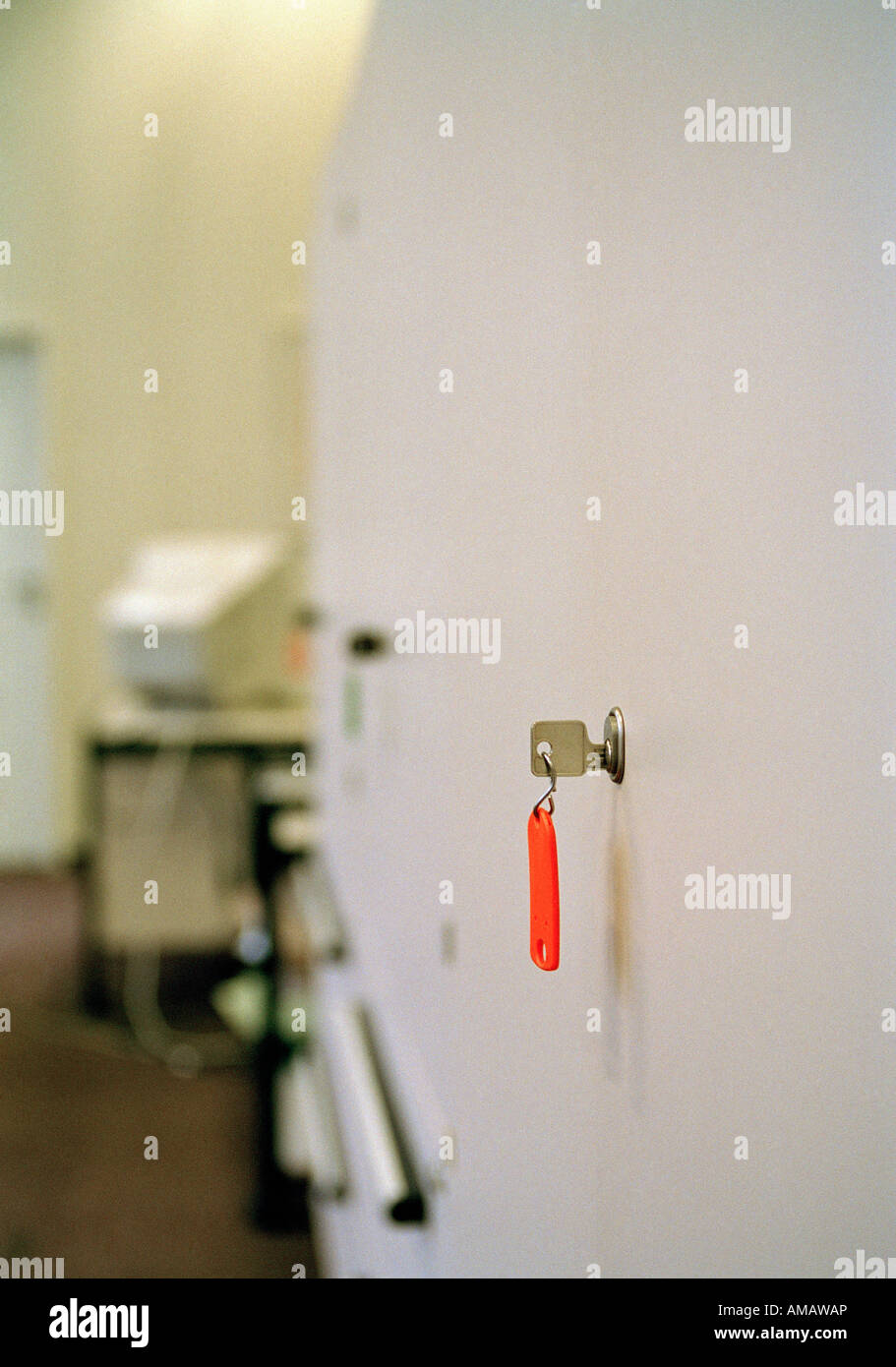 A key hanging in a lock Stock Photo