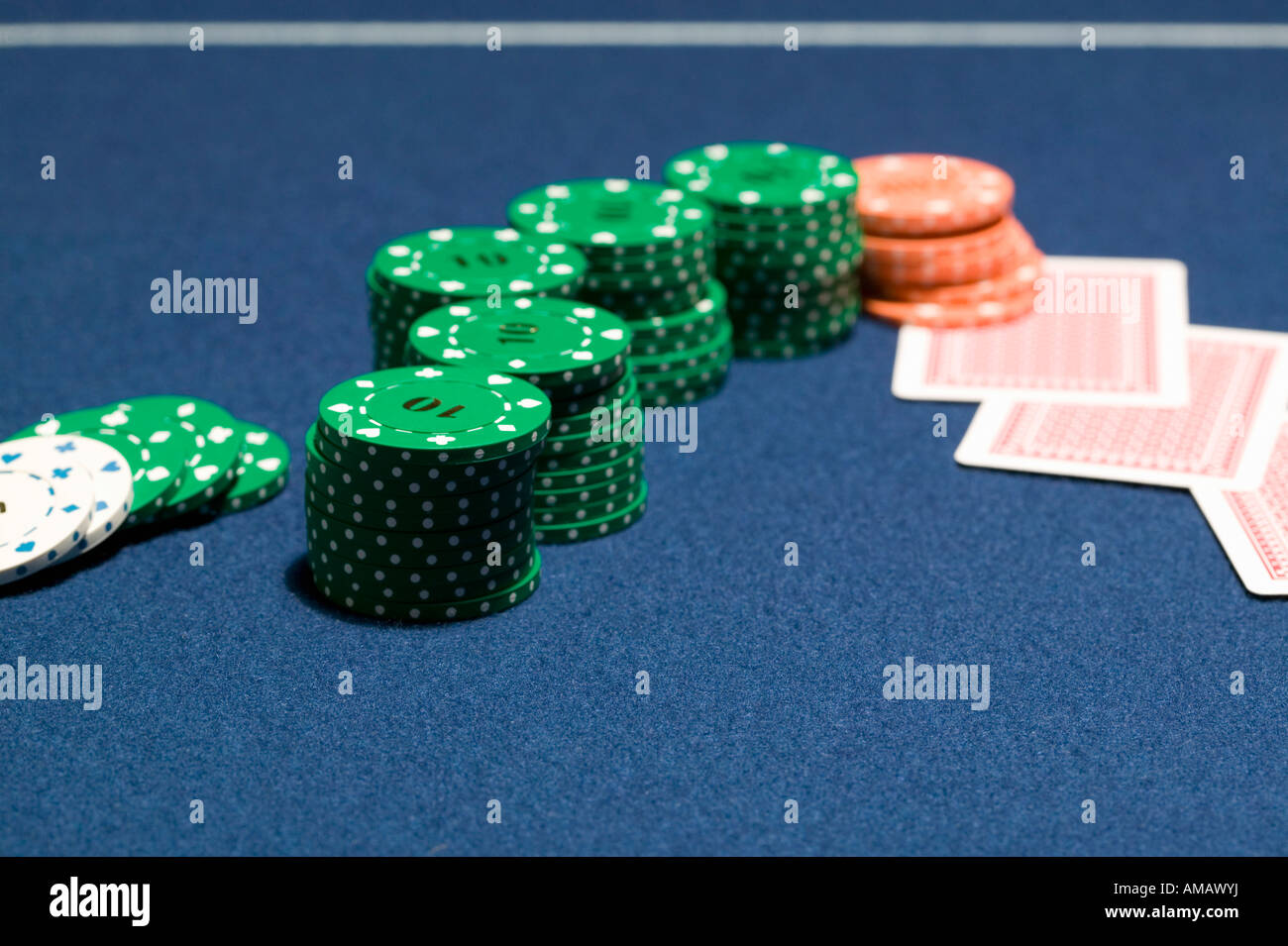 Stacks of gambling chips and playing cards Stock Photo Alamy