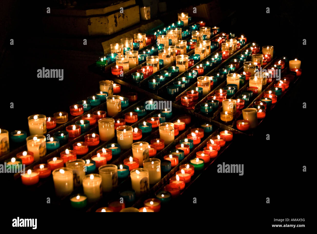 images of candles in churches in which a prayer is made and a candle