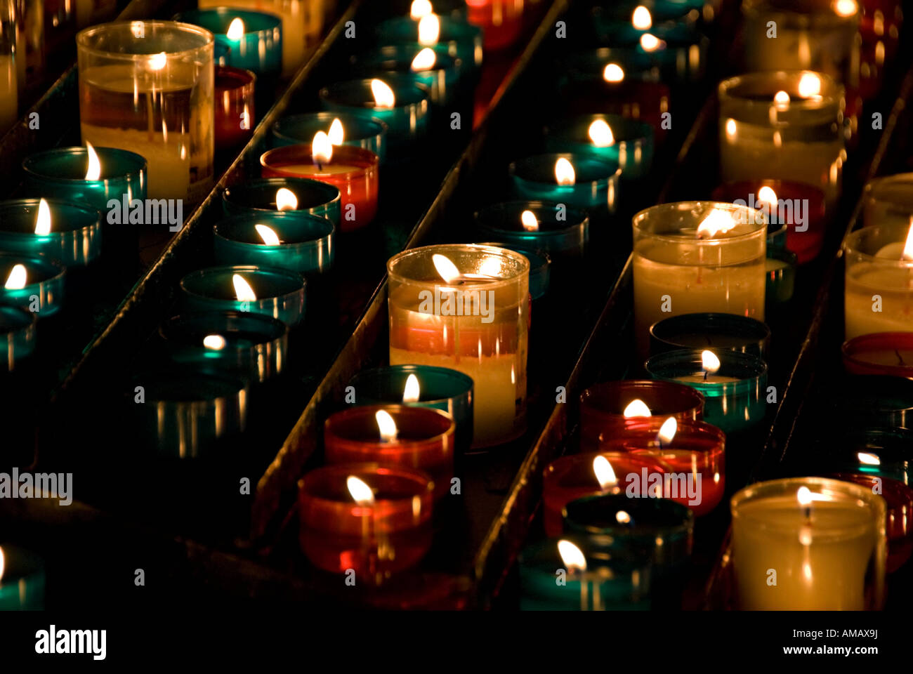 images of candles in churches in which a prayer is made and a candle