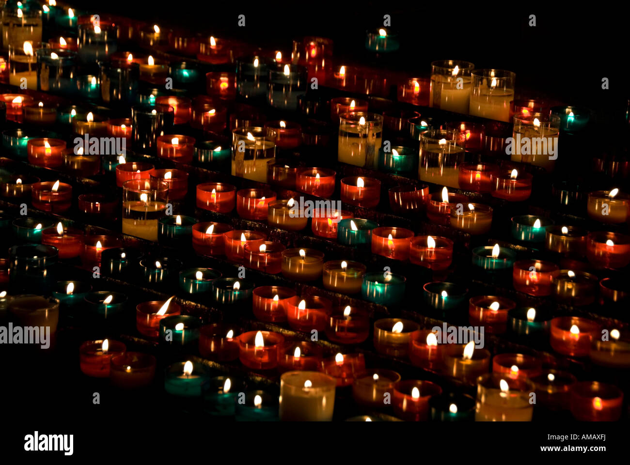 images of candles in churches in which a prayer is made and a candle