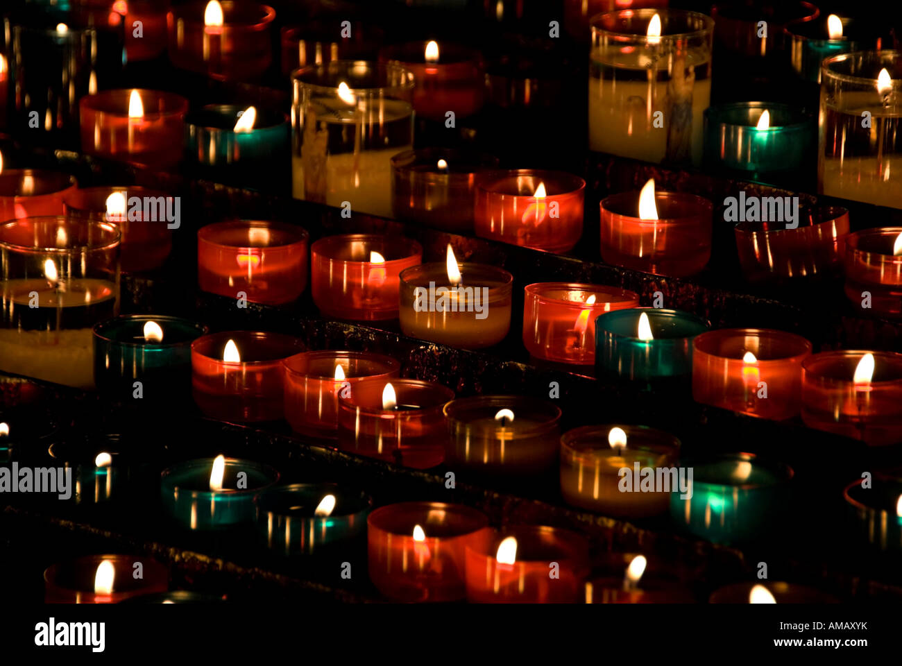 images of candles in churches in which a prayer is made and a candle