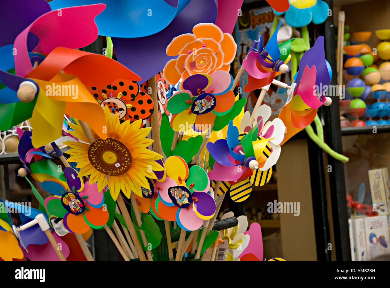 colourful windmill childrens toys on sale carcasonne Stock Photo Alamy