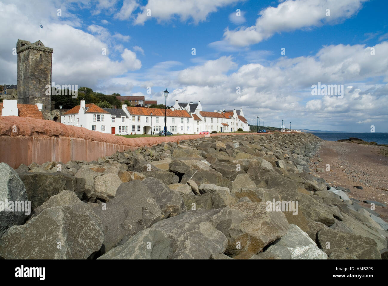 dh  DYSART FIFE Sea defence barriers St Serfs tower and white house at seafront village scotland construction Stock Photo